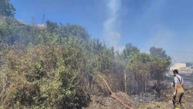 Susurluk’ta çalılık ve otluk alanda çıkan yangın söndürüldü