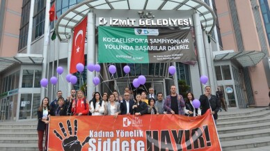 Şiddete gören kadınlar için mor balon uçurdular